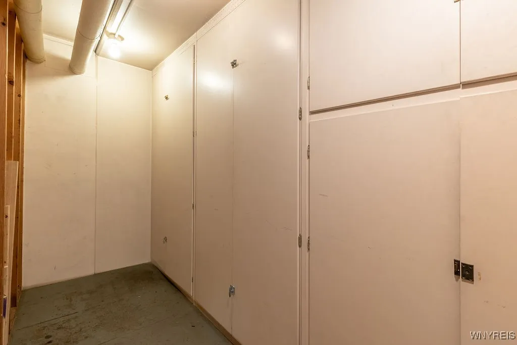 Storage unit features built-in cabinetry plus additional storage