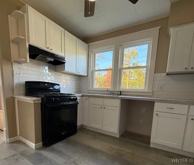 Updated kitchen! Open space for a dishwasher, beverage fridge or shelving!