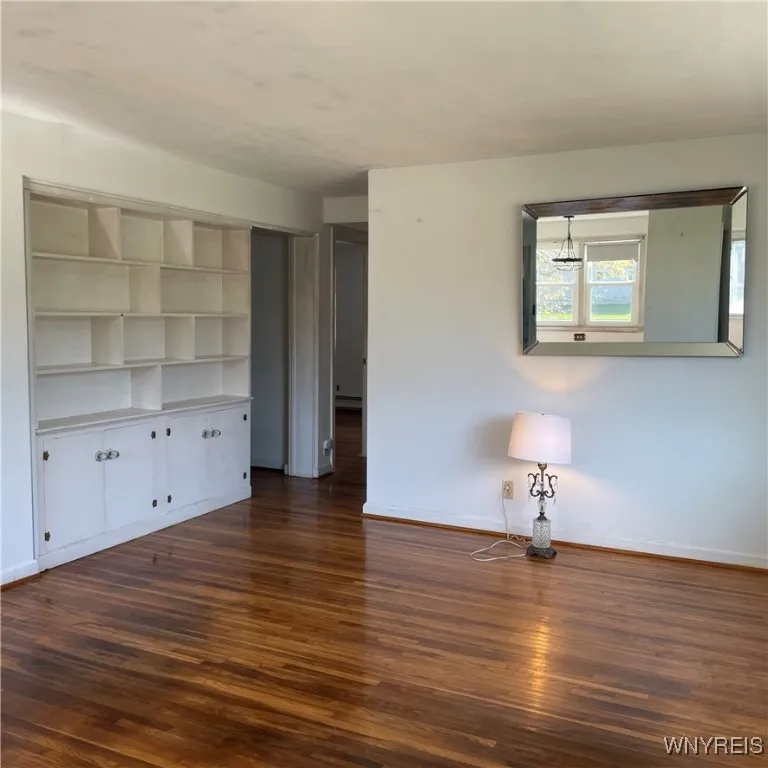 Built in shelving/moving wall