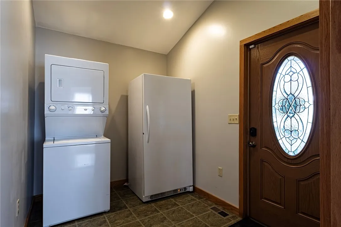 laundry room and private door in-law side withe full freezer