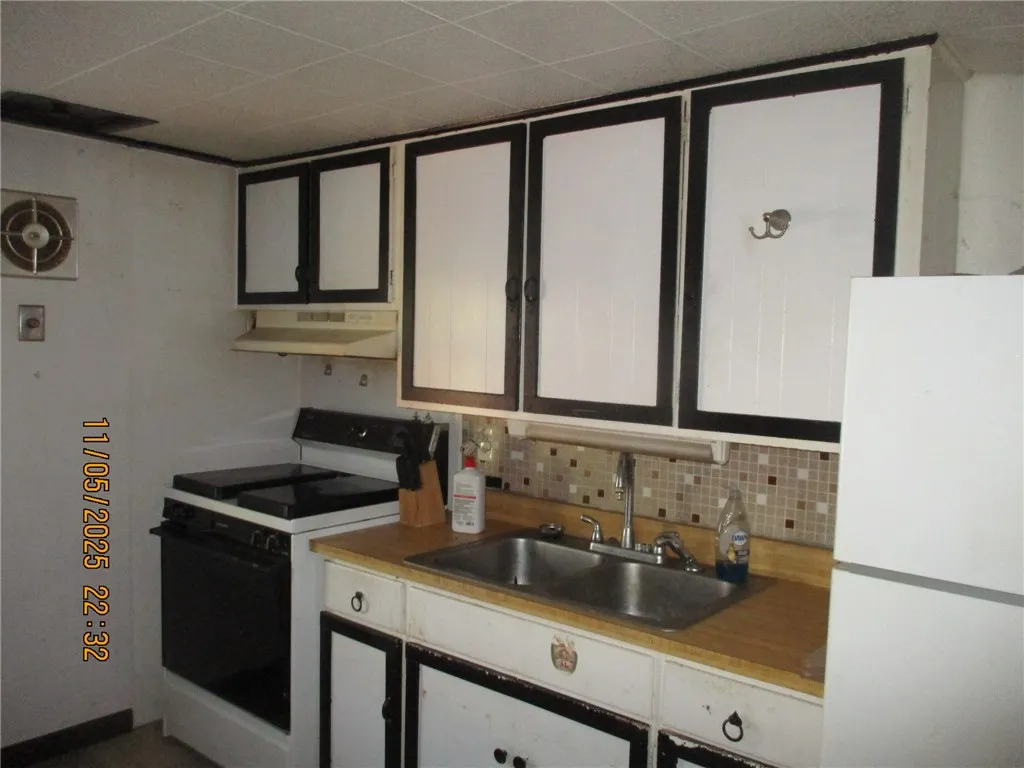 Kitchen upstairs Apt.