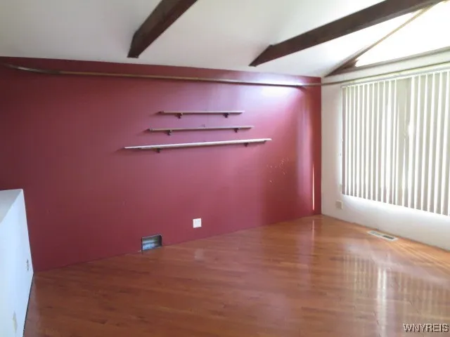 Family room with a  beautiful hardwood floor...