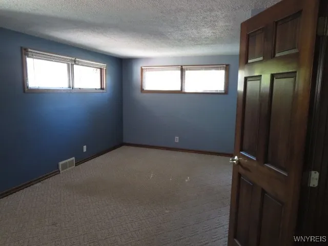 Huge primary bedroom  21X12 with plenty of room for all your large furniture...Note 6 panel hardwood doors & 2 huge closets!