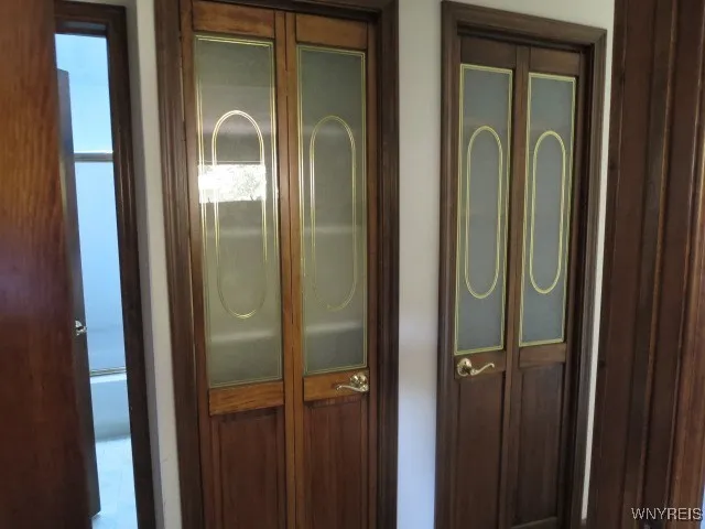 2 Hall closets with beautiful wood doors...