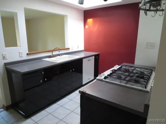 Kitchen opens to dining room & family room with all appliances....