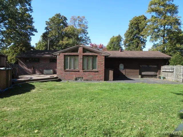 Back yard view of family room & large deck area...