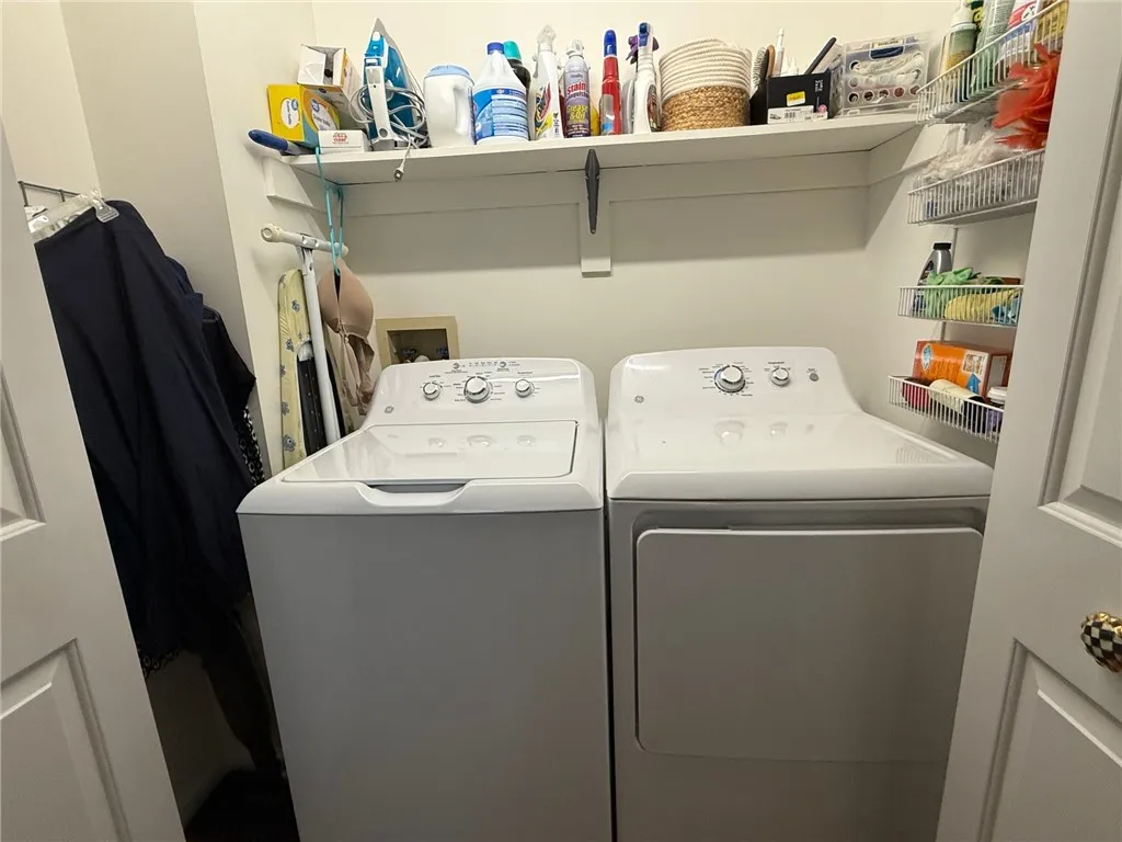1st floor laundry, relatively new washer dryer remain