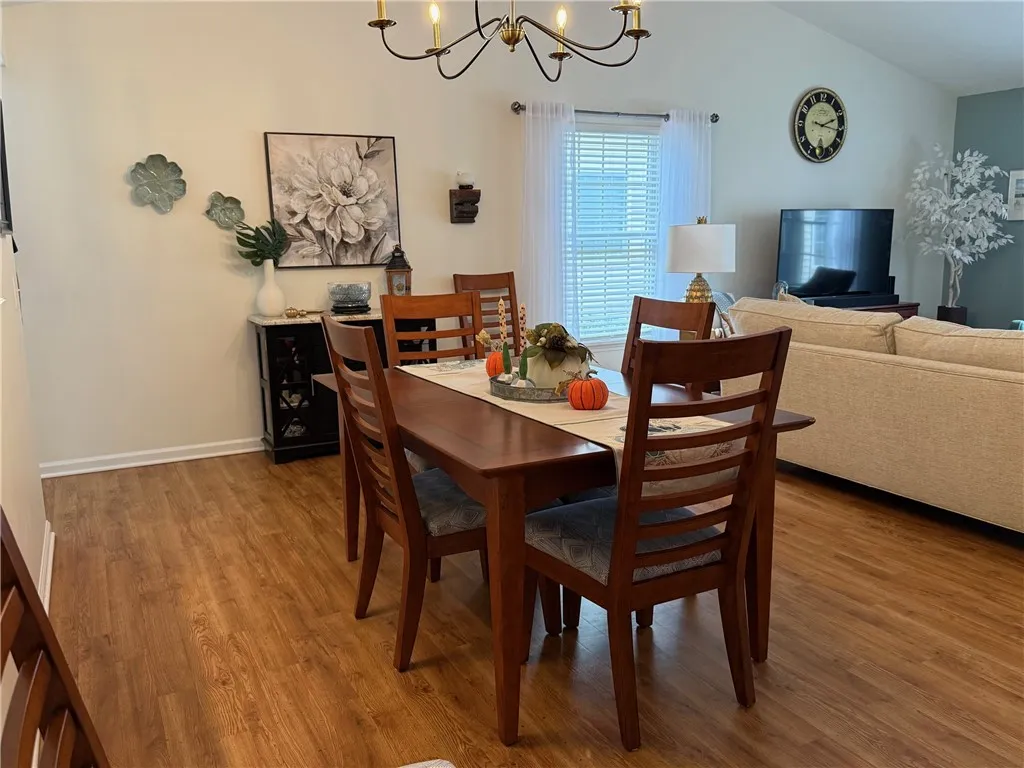 Entertain family and friends in your dining area adjacent to the living room
