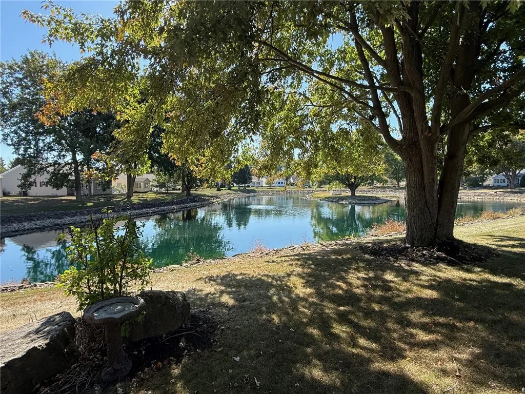 Watch the seasons change with this view backing to the pond