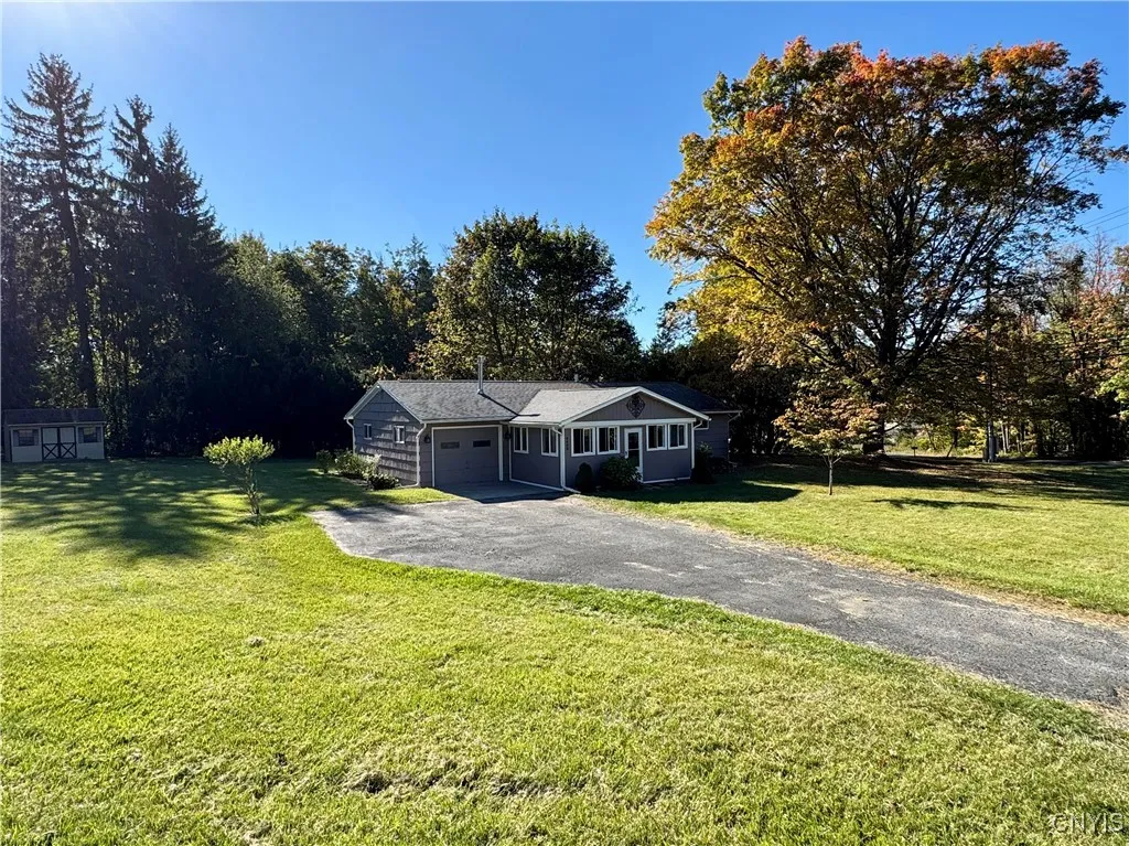 Approx half acre, level lot offers plenty of room for play, gardens, pets.