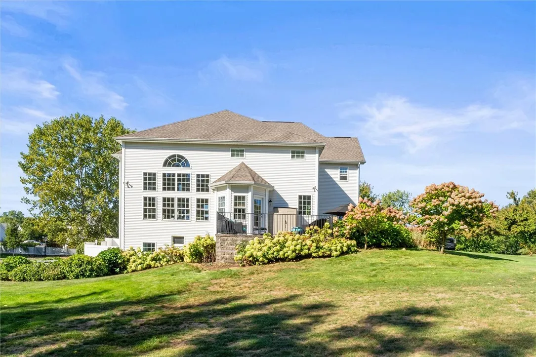 Backyard goals start here! This level, nearly 1-acre lot has room to grow—whether you’re dreaming of a pool, patio, or garden retreat.
