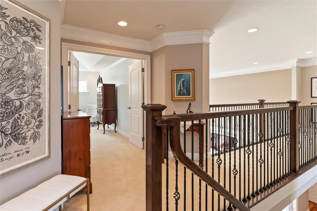 Catwalk separates bedrooms from guest suite for peace and privacy. Entrance to owner\'s suite.