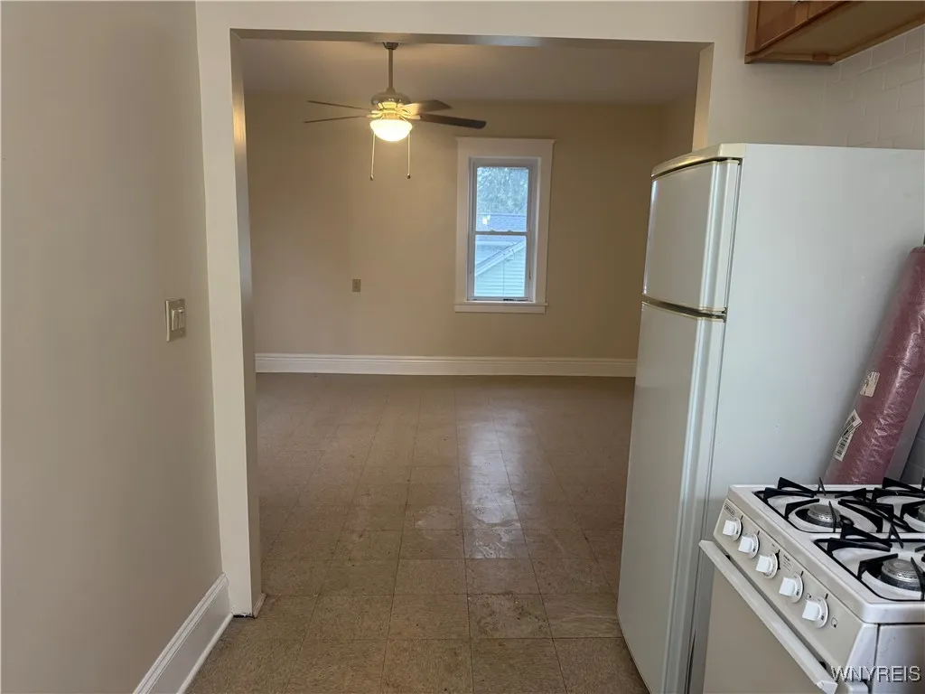 Upper kitchen into Living room