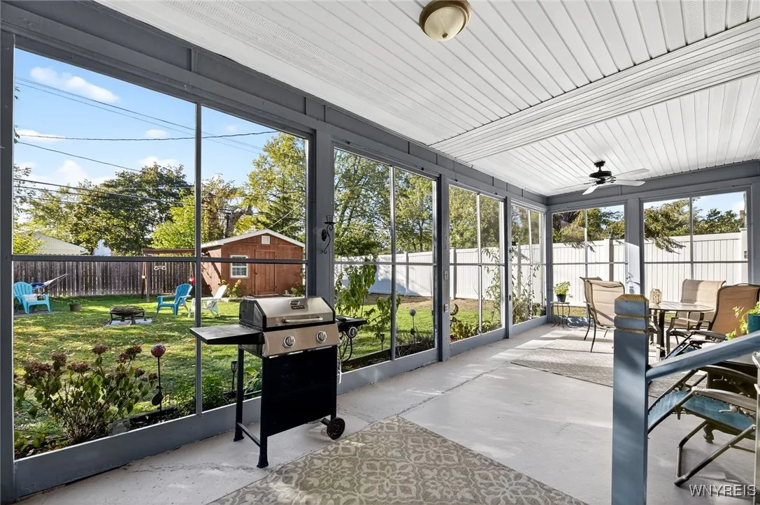 Screened porch overlooking backyard