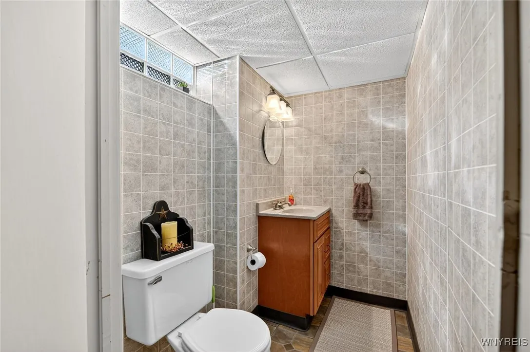1/2 bathroom in basement - clean and neat.