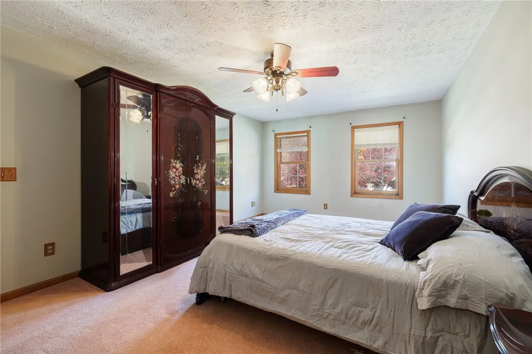 Owners Suite w/walk-in closet & attached bath