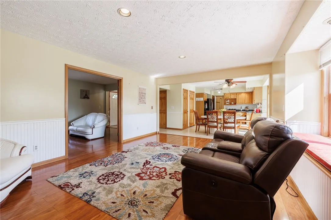 Light filled Family Room w/wood burning fireplace