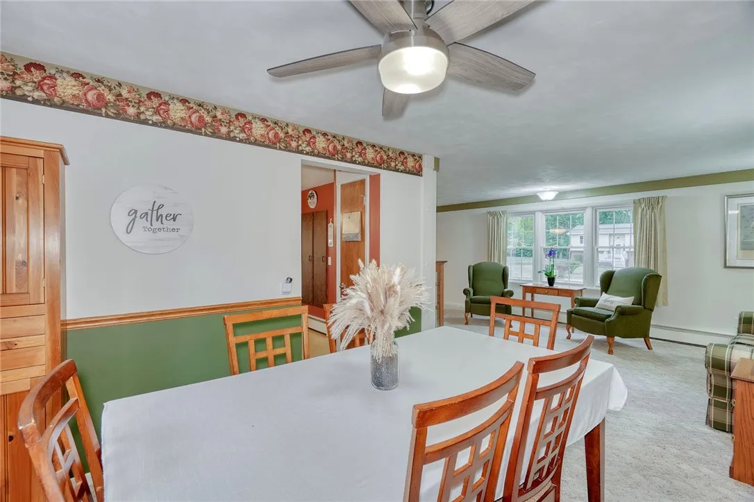 Formal dining room with new ceiling fan