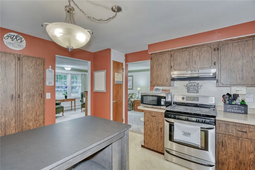 Eat-in kitchen with stainless steel appliances