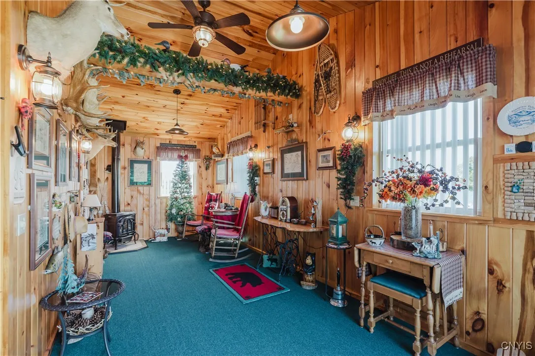 adirondack room with jotel gas stove