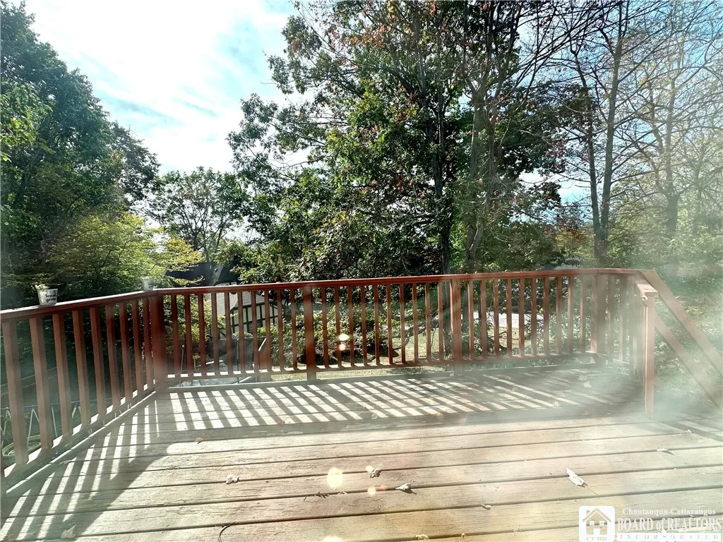 Looking through the sliding glass doors out to the deck