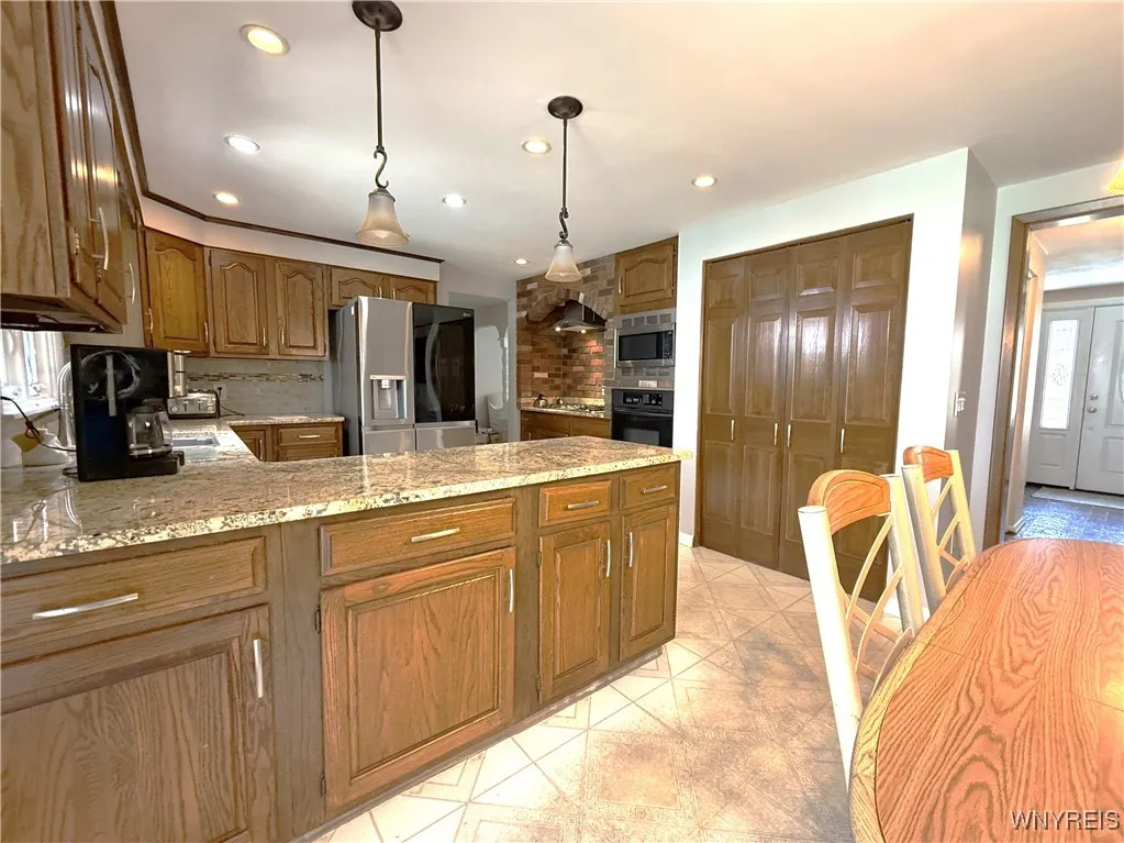 Sliding door to the patio brings so much light into the kitchen and dining area!