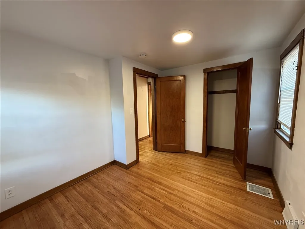 The second bedroom looking into the hallway.