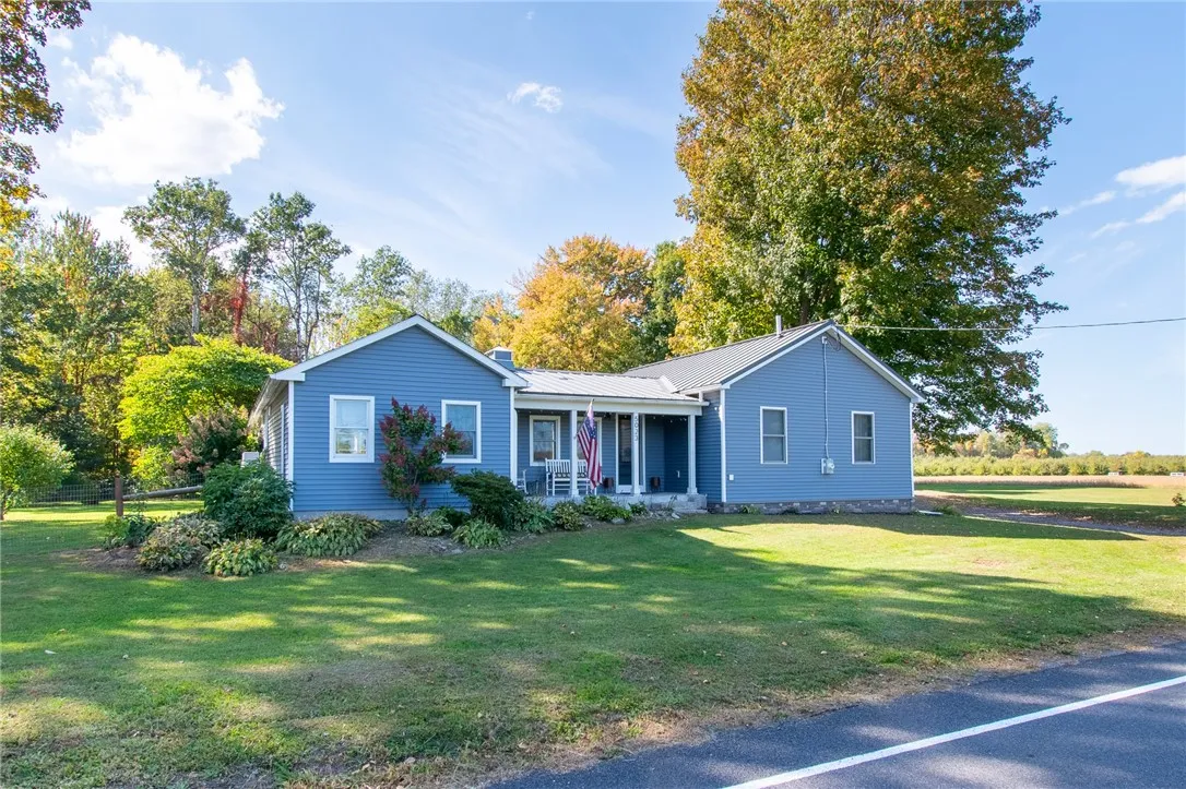 This is the MODERN FARMHOUSE you have always wanted!  Situated on a very nice country road and setting!