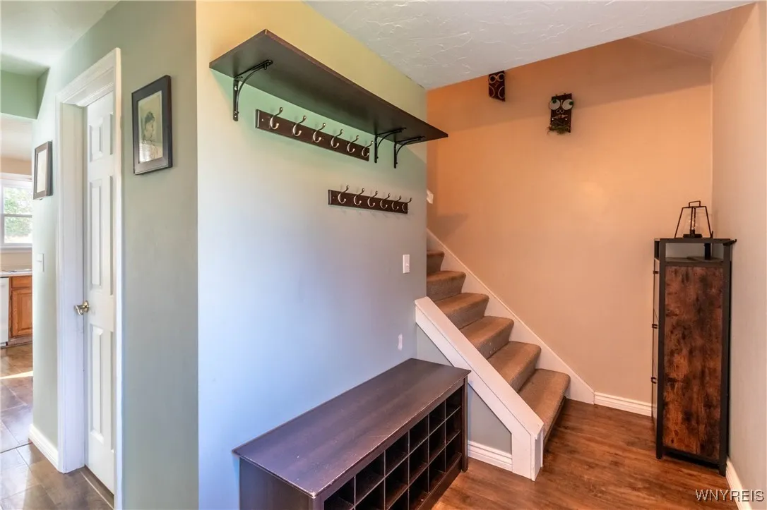Foyer opens to the living room.