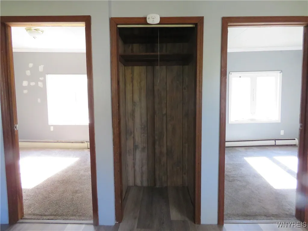 View of Doorways to both 1st floor bedrooms & Pantry off Kitchen
