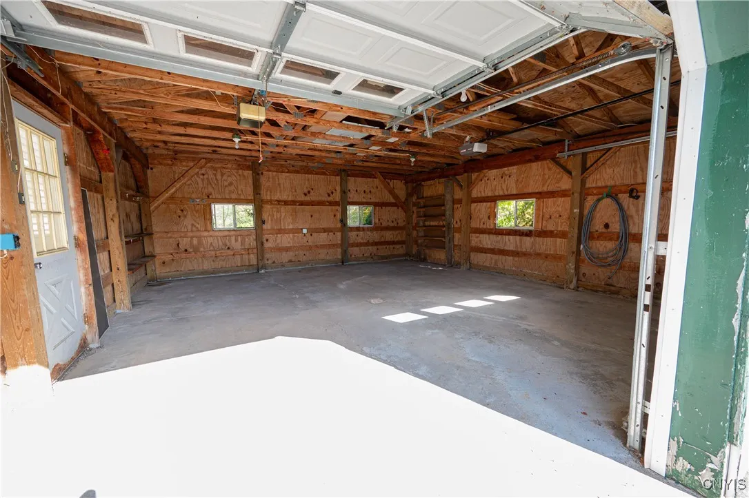 Two stall garage interior with man door