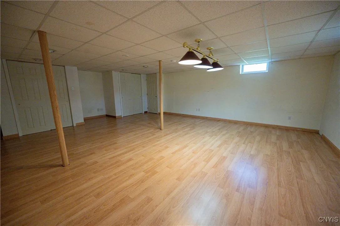 Finished portion of basement with two double closets