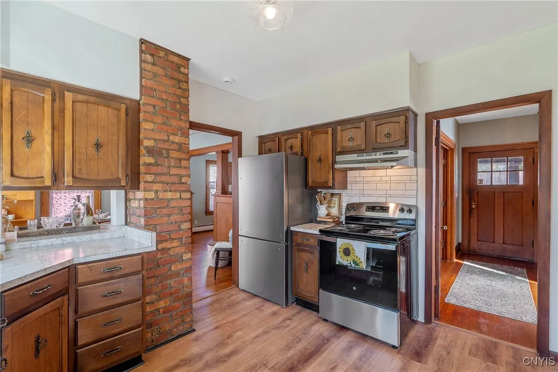 The floor plan flows beautifully, and heading back toward the front door, we will explore the bedroom level of the home.