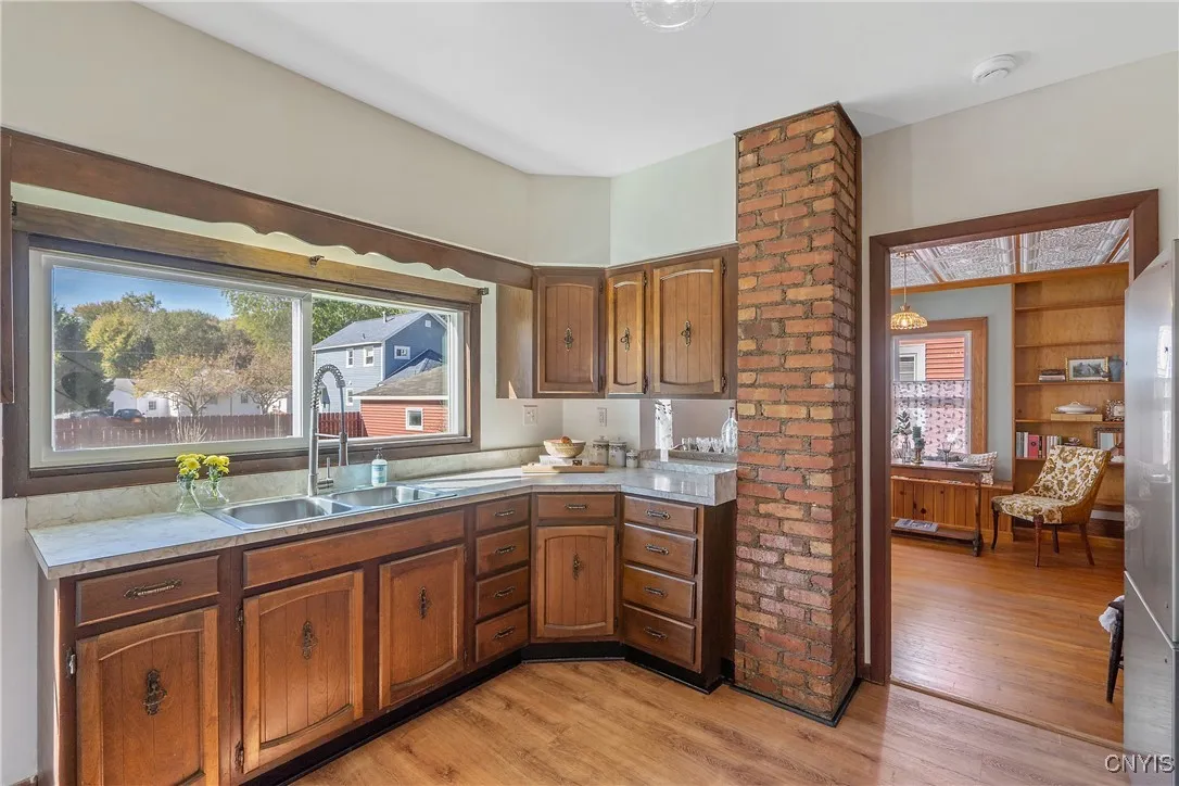 Another look at this wonderful space with a peek into the dining room and outside.