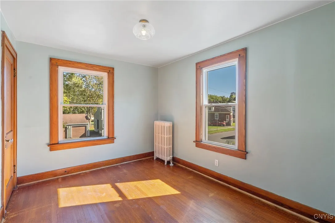Bedroom #3 provides more of the same beauty! Another good-sized room with large new windows.