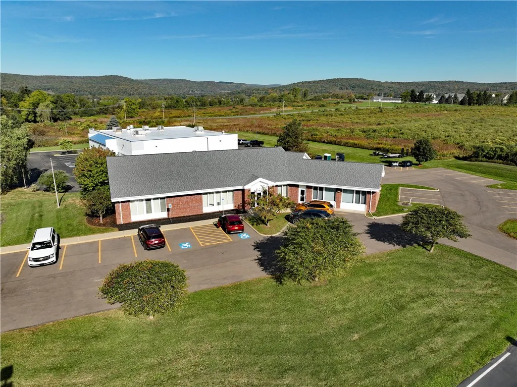 9 Parking Spaces and Main Entrance