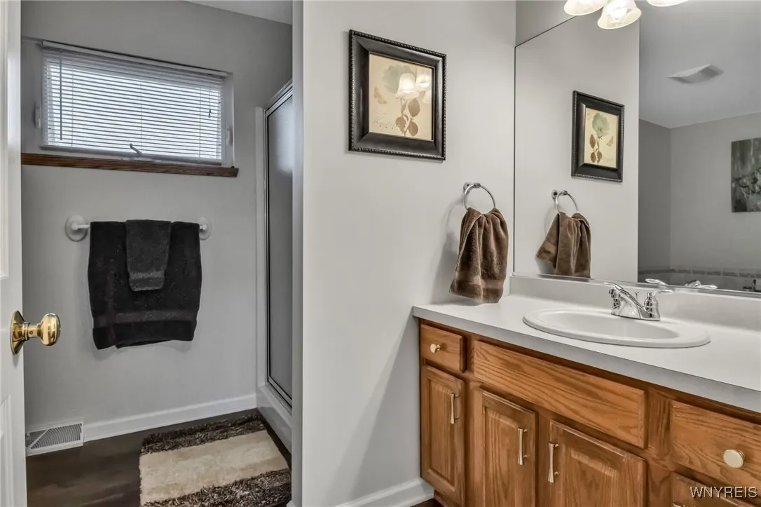 Private bath in primary bedroom suite