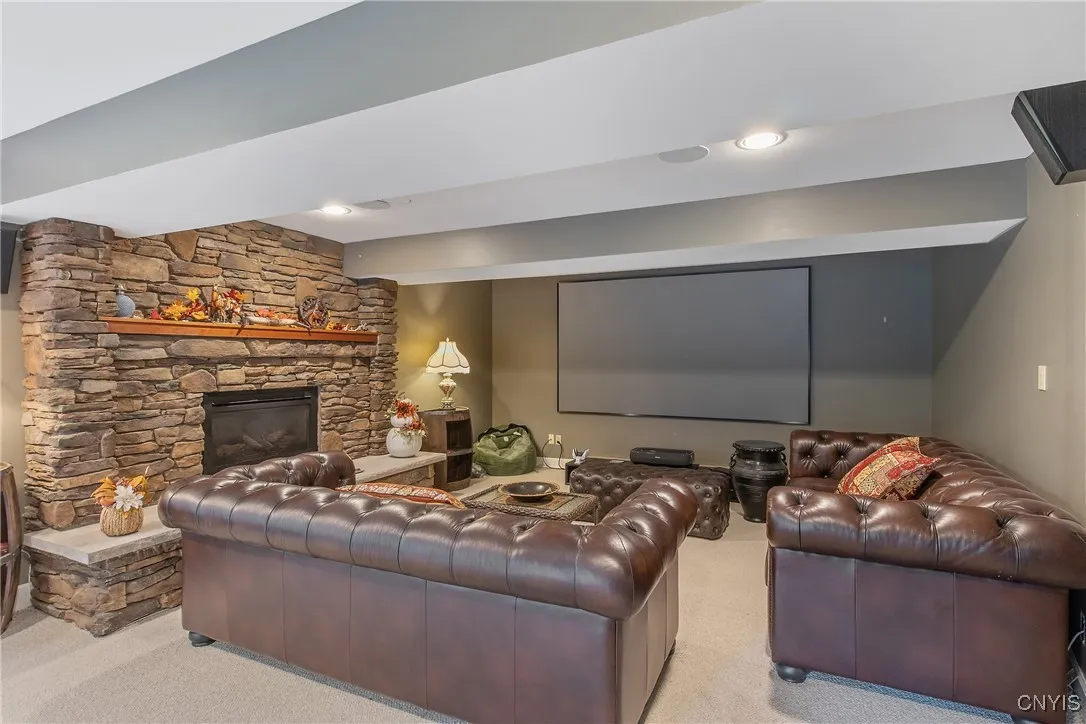 Lower Level Family Room with Adirondack Style Stone fireplace
