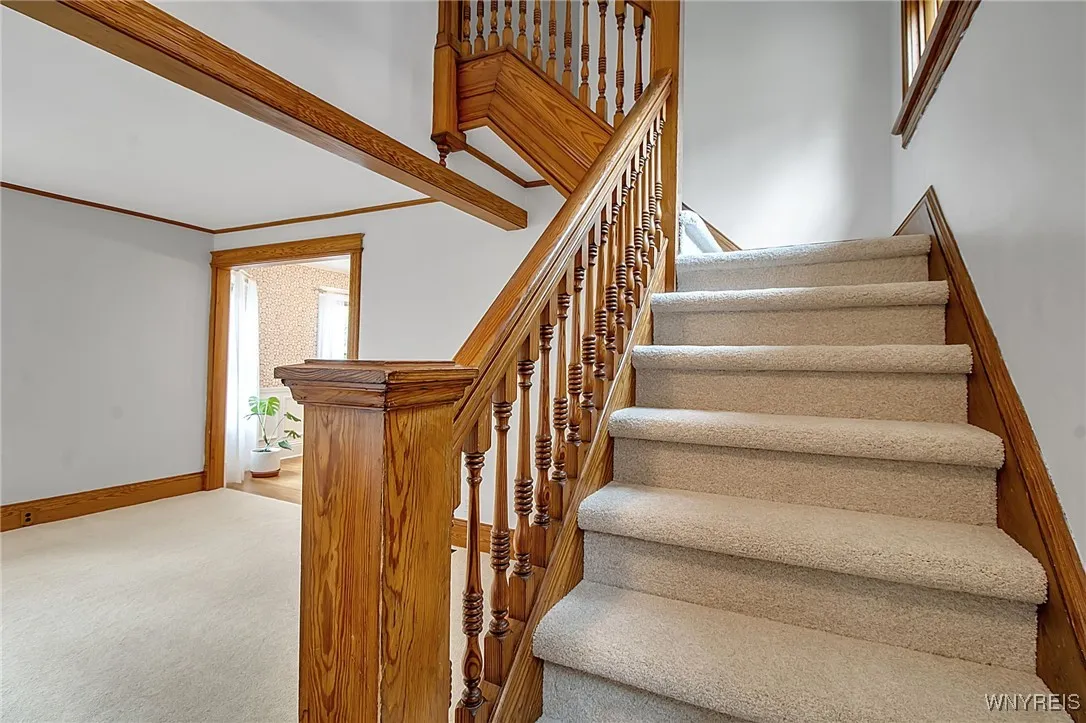 Main Staircase at front door.