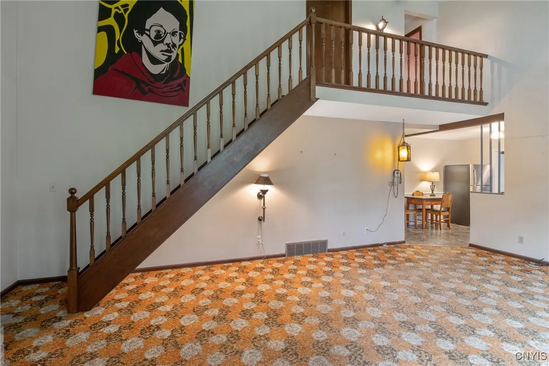 Open staircase to second level bedrooms