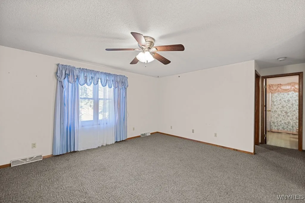 Primary suite with walk in closet and full bath