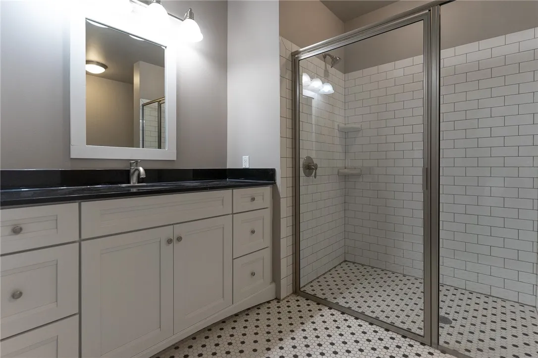 Typical spacious bathroom with step-in shower