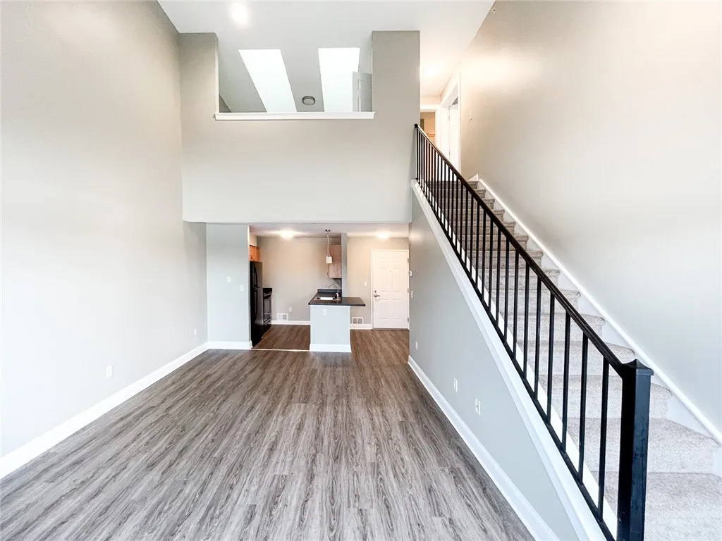 Typical Great Room with stairs to loft & upstairs bedroom