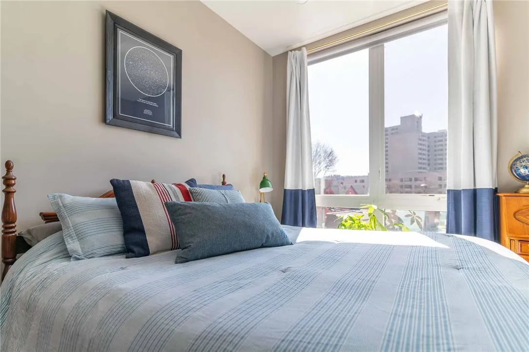Typical bedroom with large windows