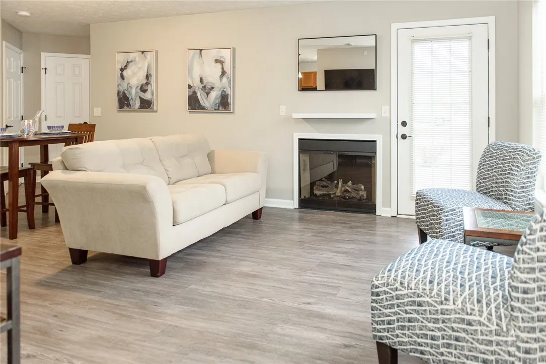 Typical Great Room with Fireplace, Living, Dining & Kitchen Areas - Lehigh Park Apartments