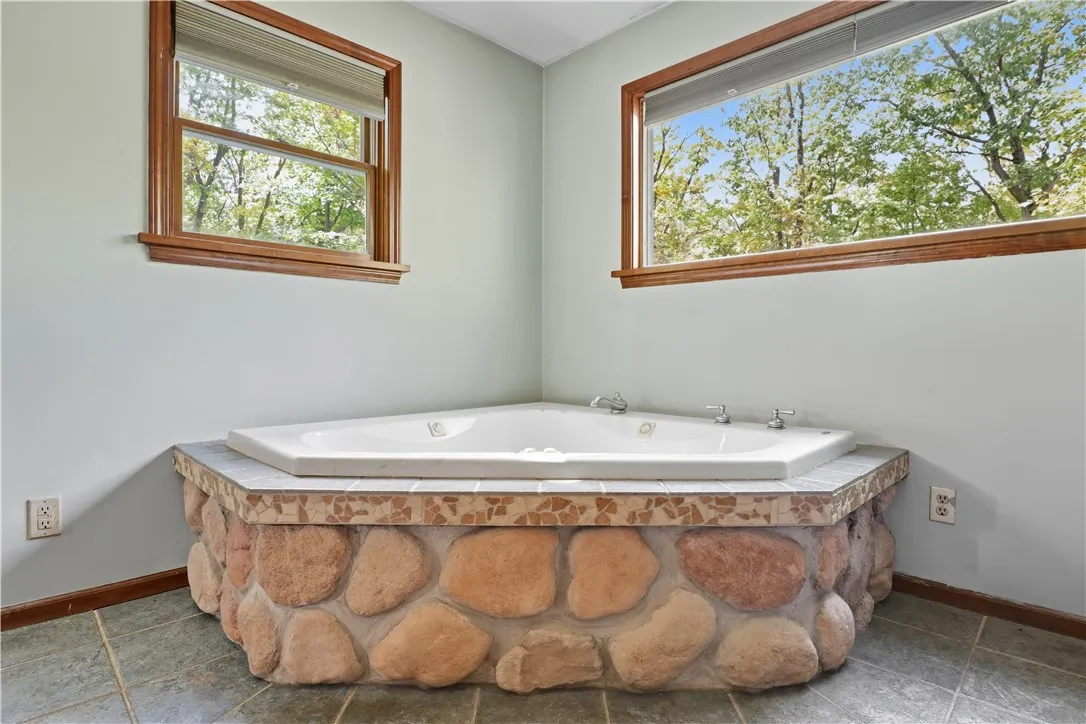 How romantic a Jacuzzi tub in the bedroom. Wow.