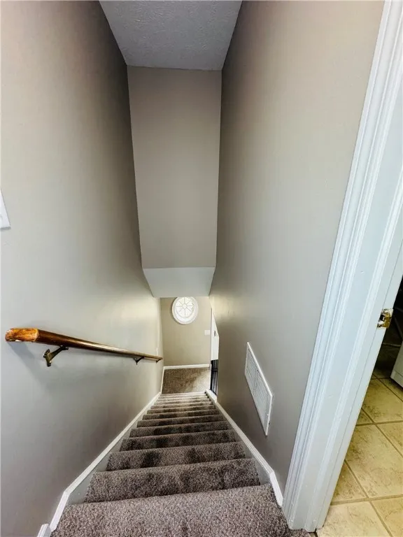 Typical stairway looking down from the 2nd floor