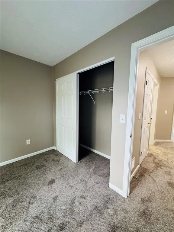 View of typical second  bedroom closet