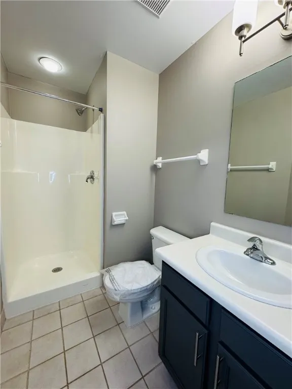 Typical upstairs full bathroom with step-in shower