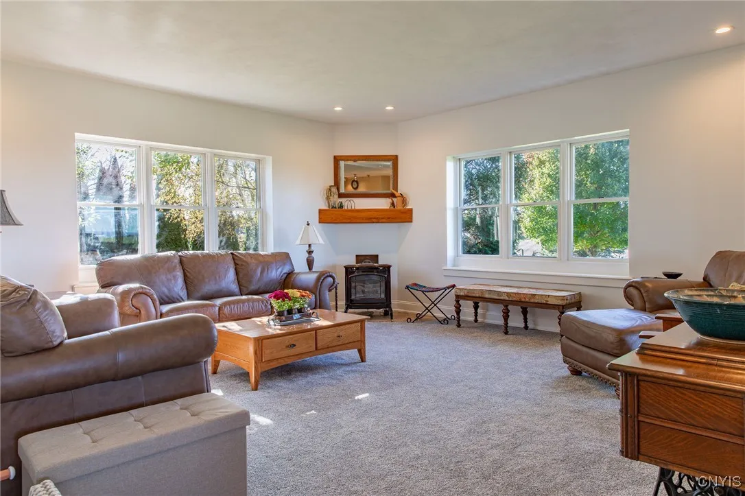Cozy living room with a vermont casting gas stove